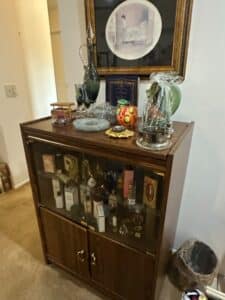 Vintage-Mid-Century-Modern-Display-Cabinet-with-Assorted-Perfume-Bottles