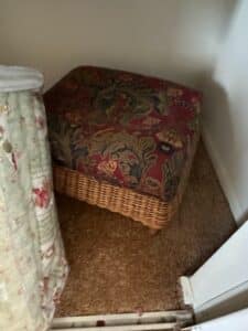 Vintage-Wicker-Ottoman-with-Floral-Upholstery