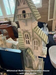 Whimsical-Multi-Story-Decorative-House-with-Vine-Motifs