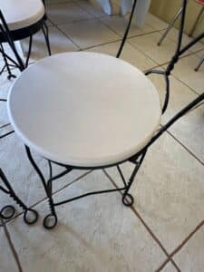 Wrought-Iron-Bistro-Set-with-Heart-Back-Chairs-and-Amber-Glass-Oil-Lamp-fifth-image