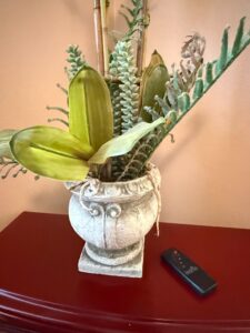 Artificial-Succulent-Arrangement-in-Distressed-Urn-Planter