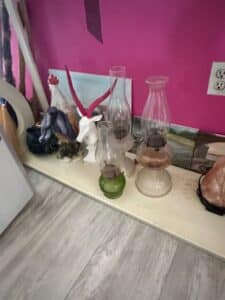Assorted-Vintage-Oil-Lamps-and-Decorative-Figurines-including-Green-Glass-Finger-Lamp-and-Antelope-Bust