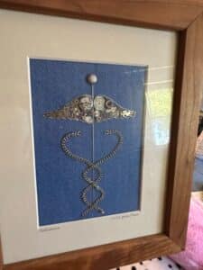 Caduceus-Assemblage-Art-with-Watch-Parts-and-Chain