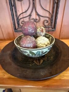 Decorative-Sphere-Collection-in-Ceramic-Bowl