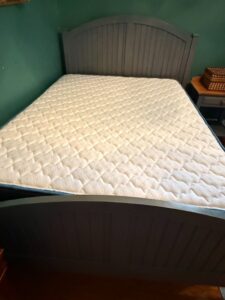 Gray-Wood-Panel-Bed-Frame-with-Quilted-Mattress