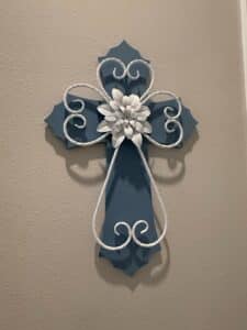 Metal-Wall-Cross-with-White-Flower-and-Scroll-Accent