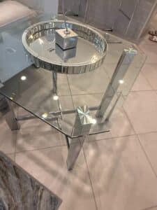 Modern-Mirrored-Glass-Coffee-Table-with-Chrome-Accents-and-Starburst-Detail