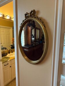 Ornate-Gilt-Oval-Wall-Mirror-with-Bow-Detail-Syroco
