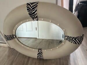 Oval-Mirror-with-Faux-Leather-Zebra-Print-Accents-and-Studs