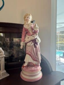 Porcelain-Figurine-of-a-Woman-in-th-Century-Attire