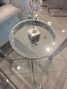Round-Mirrored-Coffee-Table-with-Rose-Sculpture