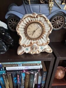 Ansonia-Porcelain-Mantel-Clock-with-Figural-Detail