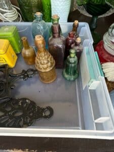 Assorted-Vintage-Apothecary-and-Perfume-Bottles-with-Cast-Iron-Piece