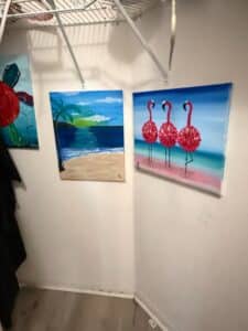 Assorted-Womens-Clothing-and-Tropical-Themed-Wall-Art-with-Flamingos-second-image-1
