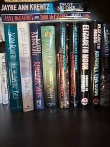 Collection-of-Romance-and-Science-Fiction-Novels-by-Nora-Roberts-Elizabeth-Lowell-Judith-McNaught-Anne-McCaffrey-Elizabeth-Moon-and-Jayne-Ann-Krentz