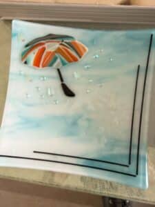 Fused-Glass-Decorative-Plate-with-Umbrella-and-Rain-Design-1