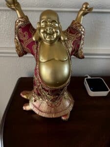 Laughing-Buddha-Figurine-on-Turtle-Base-Gold-and-Red-Brocade-1