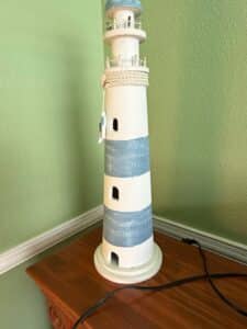 Nautical-Lighthouse-Table-Lamp-with-Rope-Detail-and-Fish-Charm-1