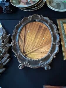 Ornate-Oval-Giltwood-Mirror-with-Floral-Motifs