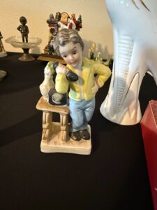 Porcelain-Figurine-of-a-Boy-with-a-Dog