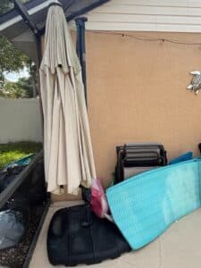 Tan-Patio-Umbrella-with-Black-Base-1