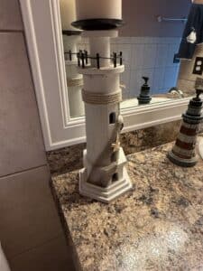 Wooden-Lighthouse-Candle-Holder-with-Netting-and-Starfish-1