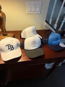 Assorted-Promotional-and-Sports-Trucker-Hats-Tampa-Bay-Rays-Sparkman-Law-Our-Tribe