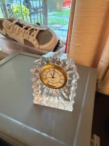 Collection-of-Assorted-Estate-Items-including-American-Family-Scale-Quartz-Clock-Golf-Ball-Coin-Bank-Soviet-Pins-and-Cassette-Tapes