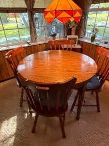 Vintage-Oak-Pedestal-Dining-Set-with-Spindle-Back-Chairs
