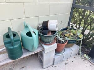 Collection-of-Assorted-Garden-Planters-and-Watering-Cans