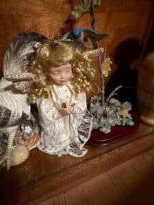 Porcelain-Angel-Figurine-with-Bluebird