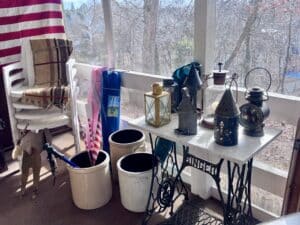 Antique Pottery, wrought iron lanterns, 48-star U.S. flag