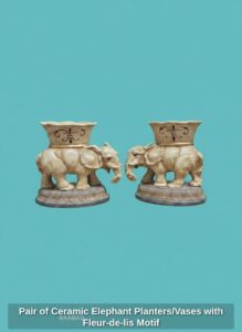 Pair-of-Ceramic-Elephant-Planters-or-Vases-with-Fleur-de-lis-Motif-second-image