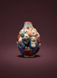 Chinese-Famille-Rose-Molded-Porcelain-Snuff-Bottle-with-Figures-fifth-image