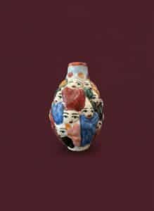 Chinese-Famille-Rose-Molded-Porcelain-Snuff-Bottle-with-Figures-fourth-image