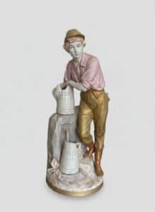 Royal-Dux-Porcelain-Figurine-of-a-Boy-at-a-Water-Pump