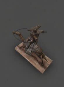 Vintage-Orientalist-Metal-Camel-and-Rider-Sculpture