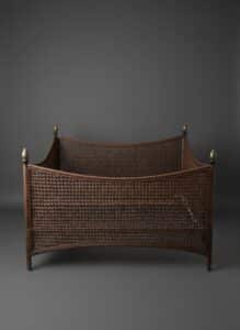 Vintage-Rattan-Daybed-with-Pineapple-Finials
