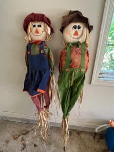Pair-of-Standing-Scarecrows-on-Poles