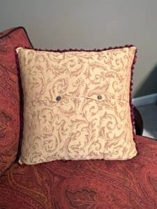 Decorative-Throw-Pillow-with-Geometric-Medallion-and-Damask-Back-second-image