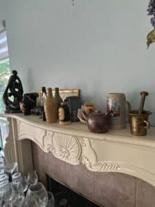 Assorted-Decorative-Mantel-Items-including-German-Stein-and-Abstract-Sculpture