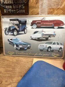 Cadillac-Excellence-Through-the-Years-Metal-Sign