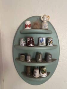 Collection-of-Assorted-Thimbles-and-Vintage-Display-Shelves