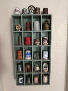 Collection-of-Assorted-Thimbles-and-Vintage-Display-Shelves-second-image