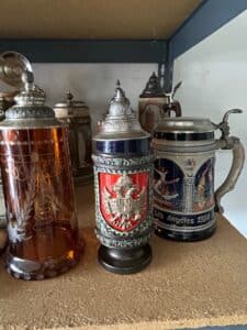 Collection-of-German-Beer-Steins-and-Decorative-Plates-including-Los-Angeles-Olympic-Stein-and-Mnchen-Crest-Plaque-fourth-image-1