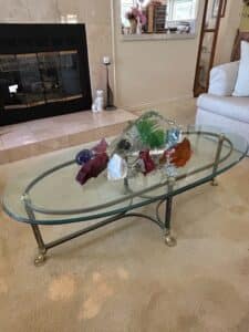Oval-Glass-Top-Coffee-Table-with-Lucite-Butterfly-Wing-Base