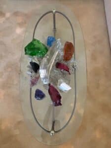 Oval-Glass-Top-Coffee-Table-with-Lucite-Butterfly-Wing-Base-second-image