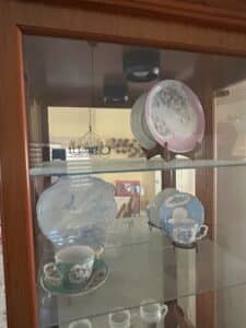 Vintage-Display-Cabinet-with-Assorted-Decorative-China-and-Collectibles-second-image