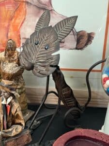 Artisan-Metal-Cat-Sculpture-with-Leaf-Face