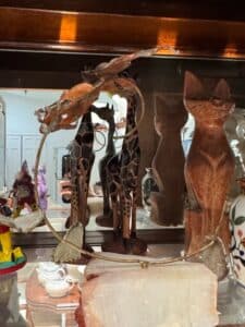 Hand-Carved-Wooden-Giraffe-Pair-and-Stylized-Cat-Figurine